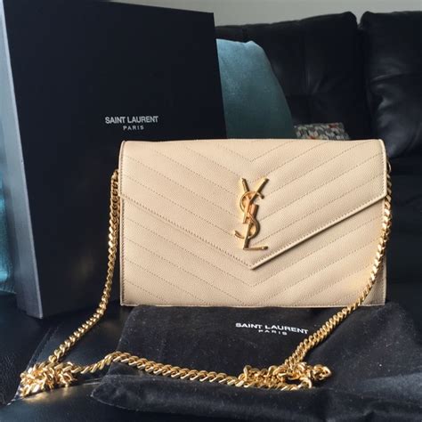 ysl cream handbag.